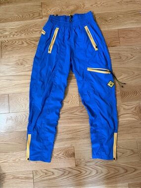 REI Royal Blue Cargo Track Pants with Yellow Accents